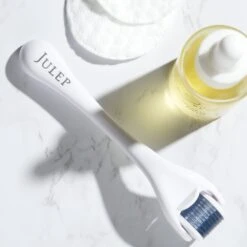 Slowpoke Microneedling Facial Roller -GlowNest Store JULEP SlowpokeMicroneedlingFacialRoller LIFESTYLE3 ECommerce JPG