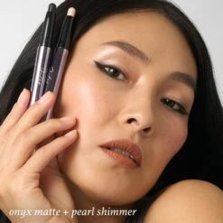Eyeshadow 101 Crème-to-Powder Eyeshadow Stick Duo, Pearl Shimmer & Onyx Matte -GlowNest Store Julep ES101HOLIDAY OnyxMatte PearlShimmer ApplicationImage1w ShadeCallout ECommerce JPG